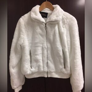 Women's white stylish faux fur jacket.